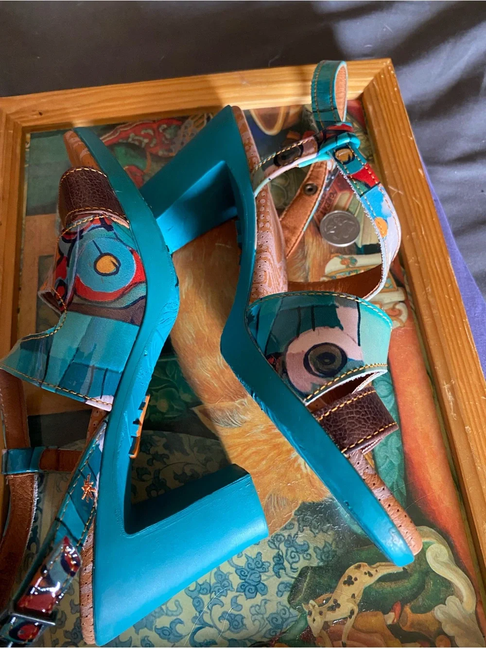 The Art Company, featuring a turquoise and multi-colored abstract pattern